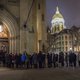 Students wait in line outside of the Basilica of the Sacred Heart to pay respects at the visitation